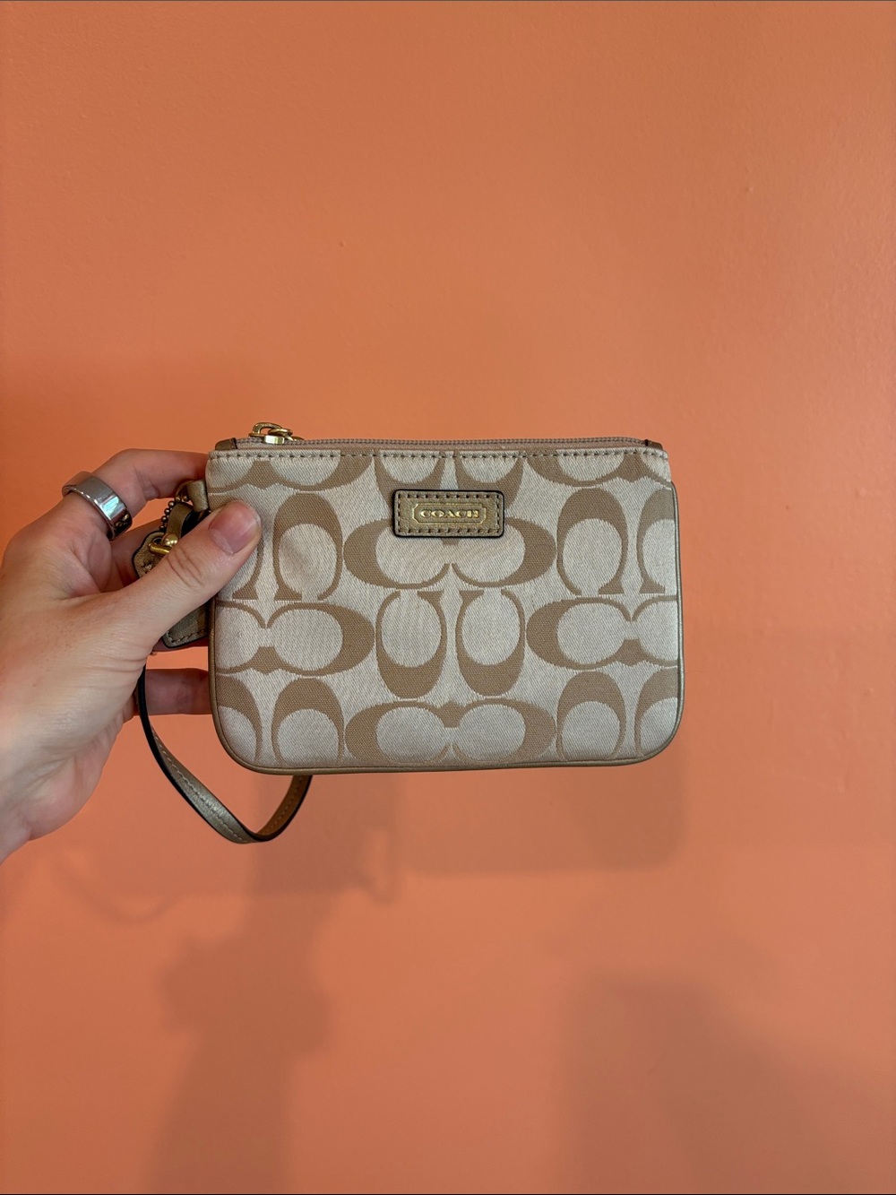 Never used - Coach Signature Canvas Wristlet in Beige